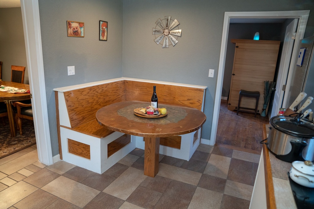Kitchen meal spot or work station  Add chairs from adjoining dining room.