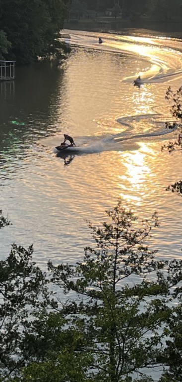 Fun on the lake at dusk