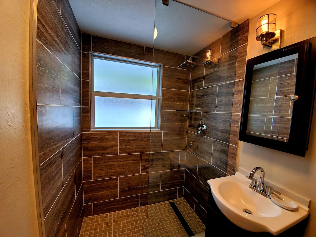 Newly renovated bathroom with rain shower head.