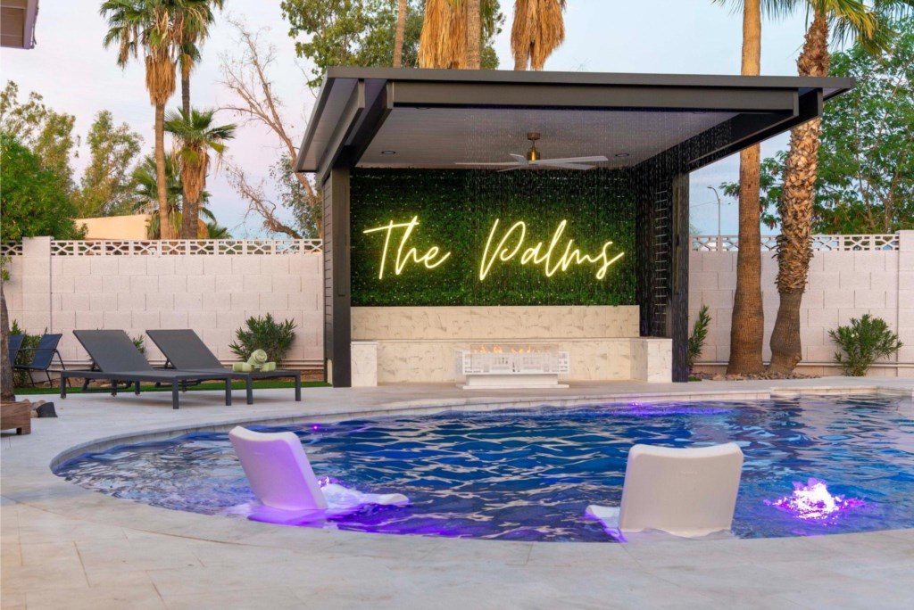 Palms pool area heated. Please note the firepit isn’t working under neon sign 