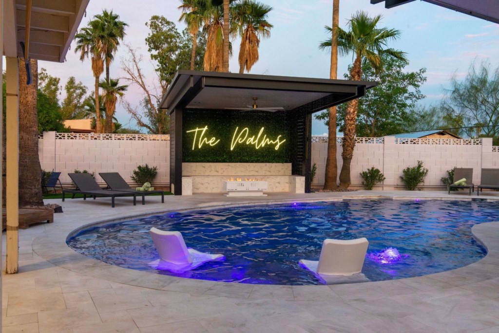 The Palms. Please note the firepit isn’t working under neon sign 