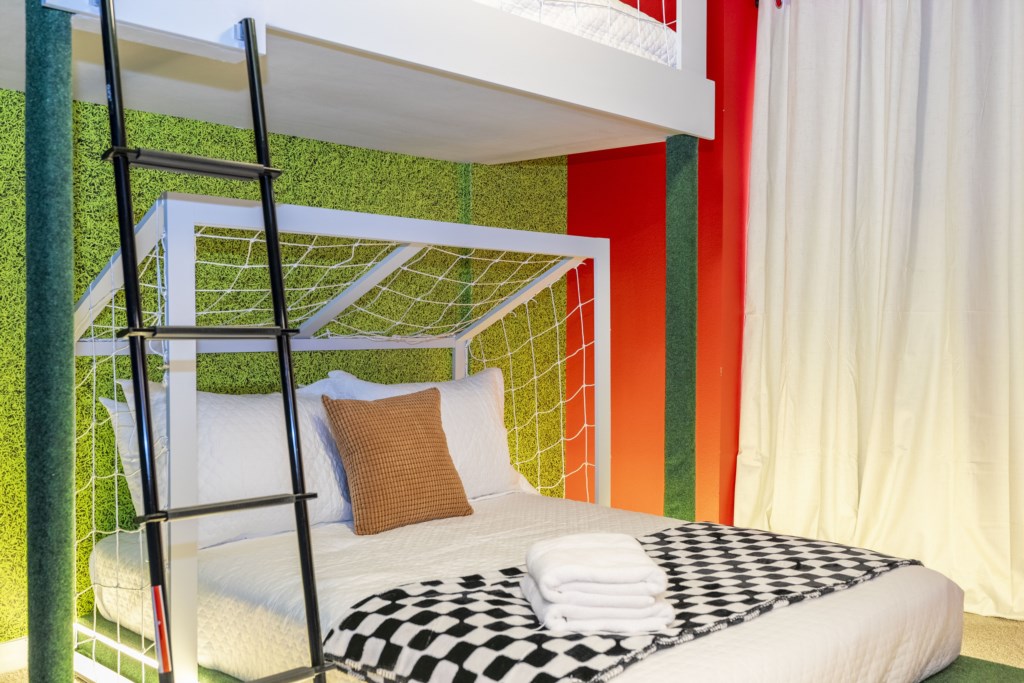 Soccer Themed Bedroom with bunk bed twin over full