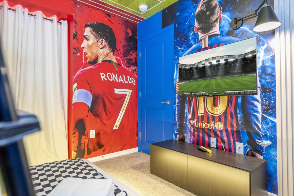 Soccer Themed Bedroom with bunk bed twin over full