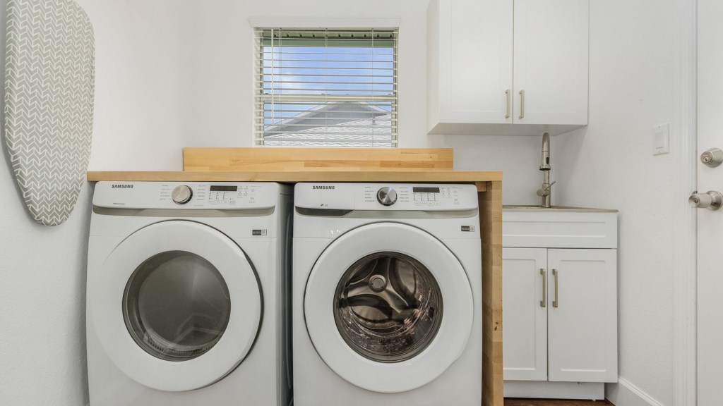 Convenient in-home laundry with modern washer and dryer.