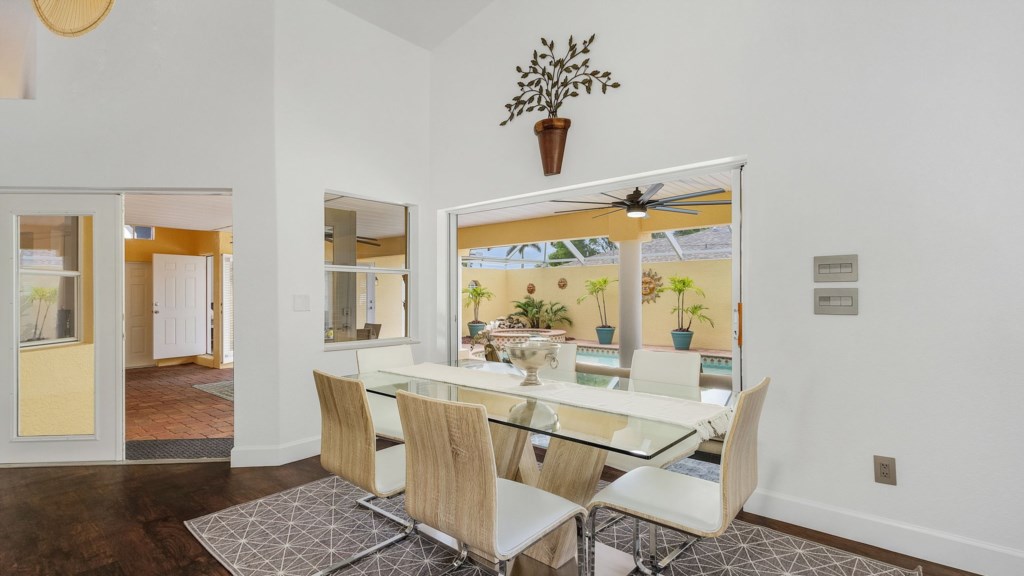 Elegant dining area with seating for six, perfect for family meals.