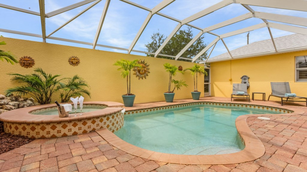 Relax by the private, screened-in pool with tropical vibes and total privacy.