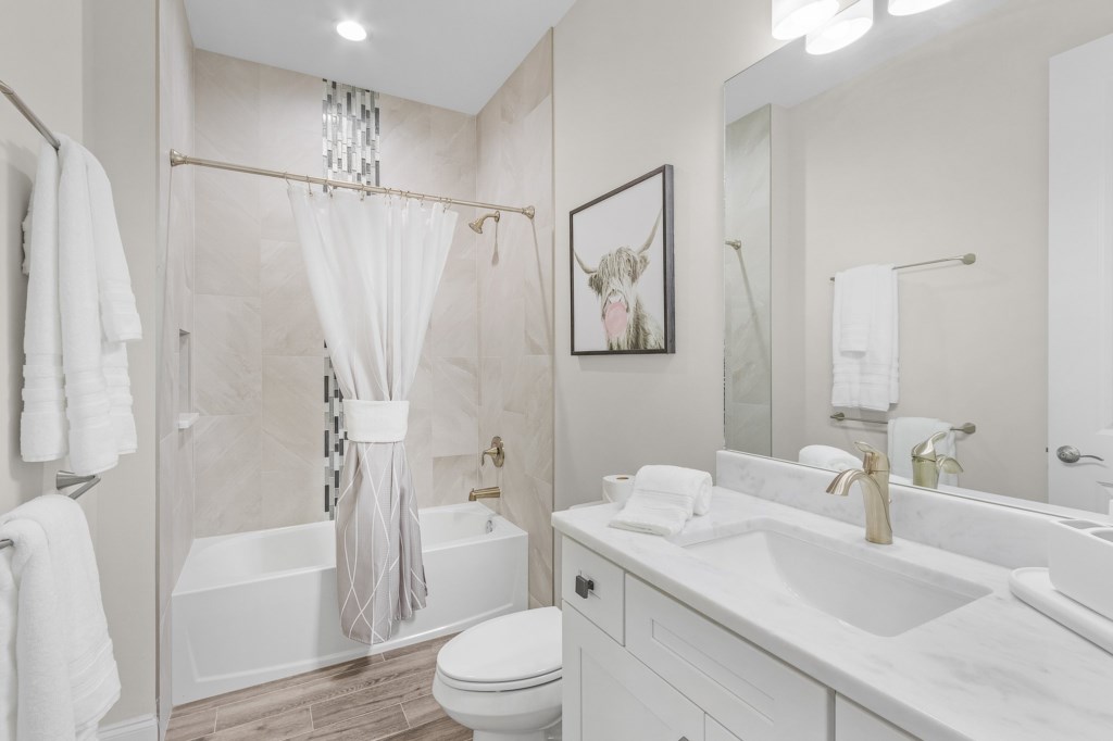 Modern bathroom with a relaxing tub and stylish décor for a spa-like experience.