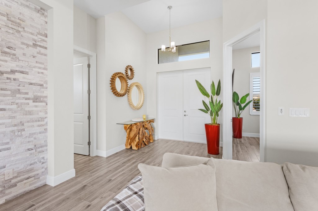 Bright, stylish entryway with chic décor to welcome you as you walk in.