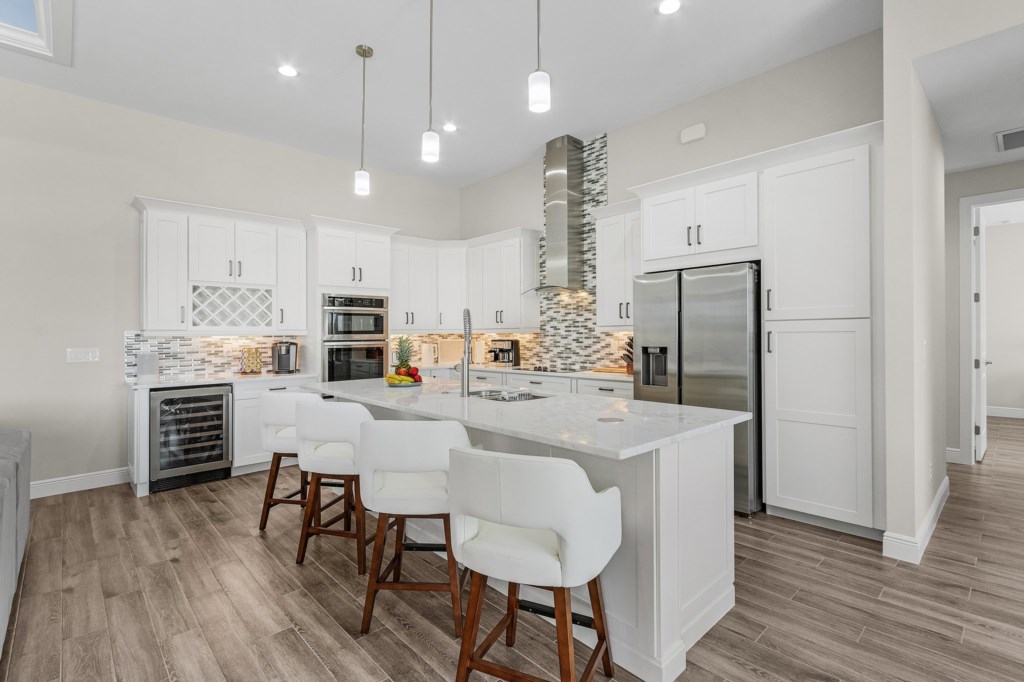 Bright kitchen with a large island, perfect for meals and gatherings.