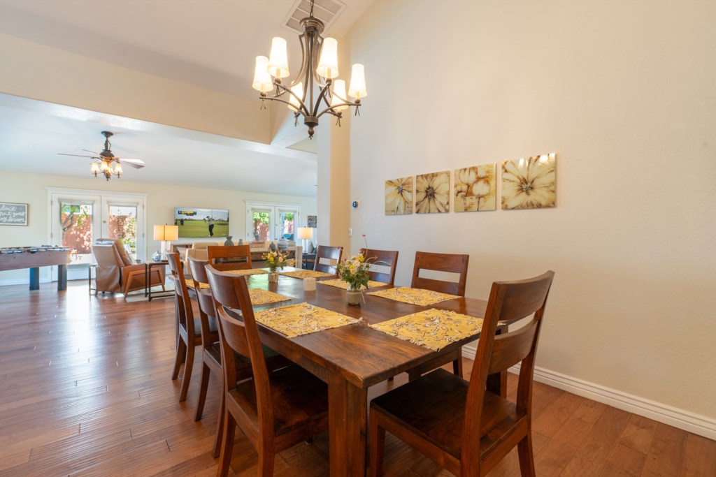 Elegant dining area with seating for six, perfect for family gatherings.