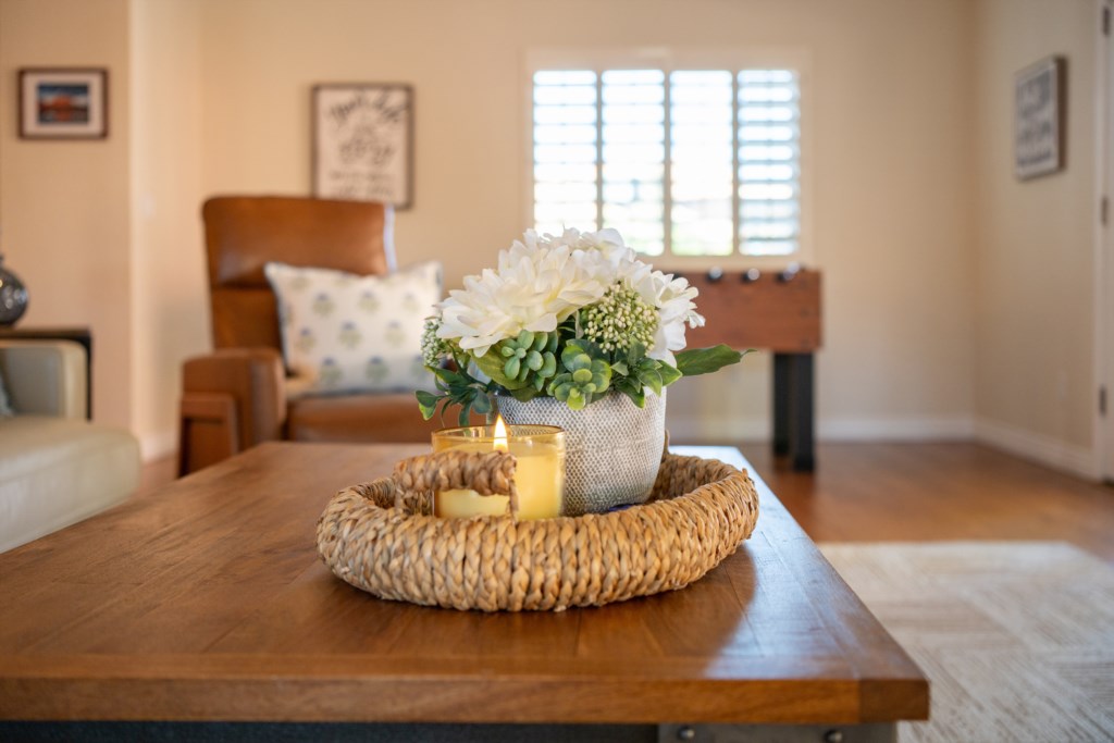 Cozy living area with a foosball table and comfortable seating for relaxation.