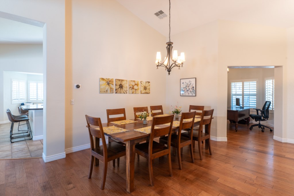 Elegant dining area with seating for eight, perfect for family gatherings.