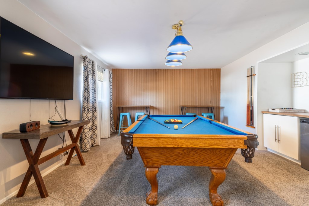 game area with pool table and Smart TV