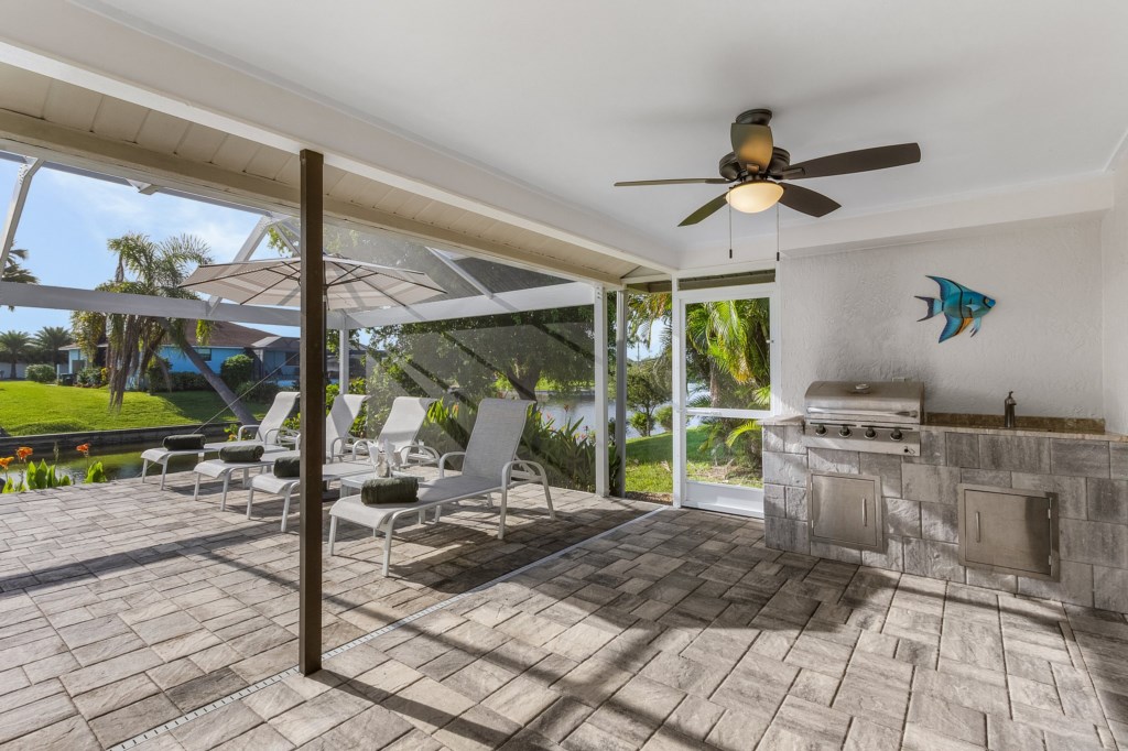 Relax in the cozy outdoor lounge with ceiling fan and plenty of shade.