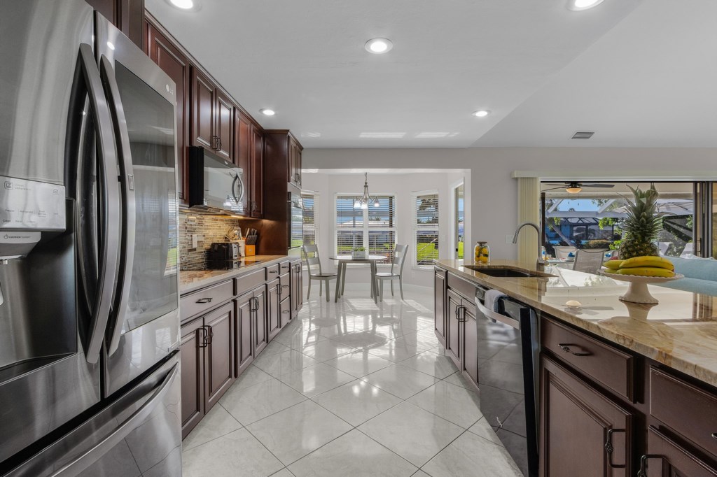 Sleek, modern kitchen with a large island and plenty of counter space for meal prep.