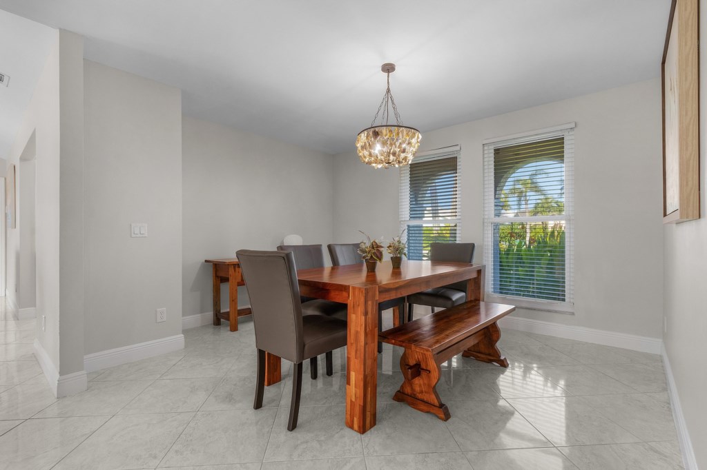 Elegant dining room with seating for six, ideal for enjoying meals with family and friends.