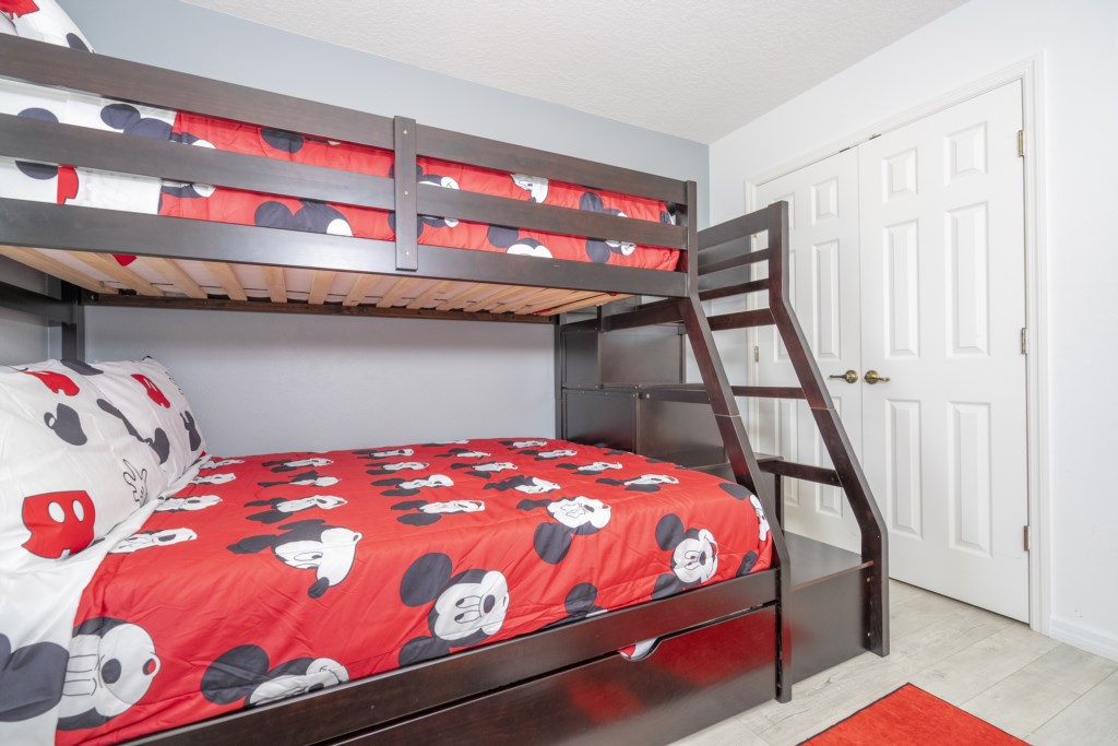 Upstairs Third bedroom with a full/twin bunkbed.