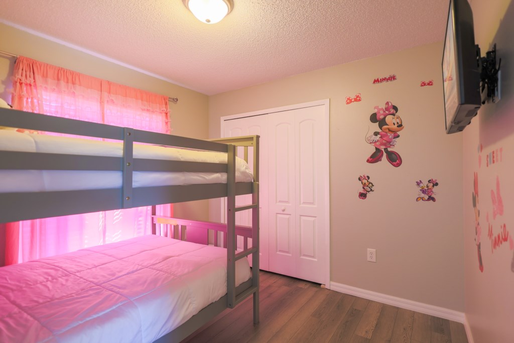Minnie Mouse Theme Room with 2 full beds.
