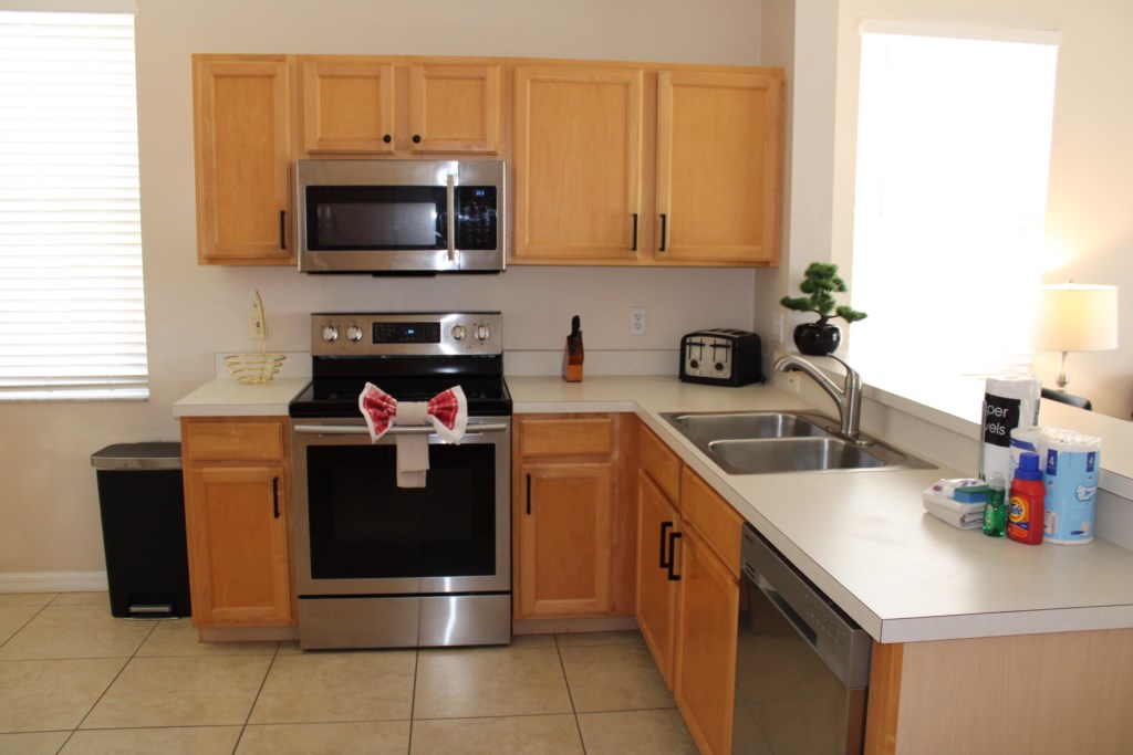 fully equipped kitchen features high-end stainless steel appliances equipped kitchen with stainless steel appliances