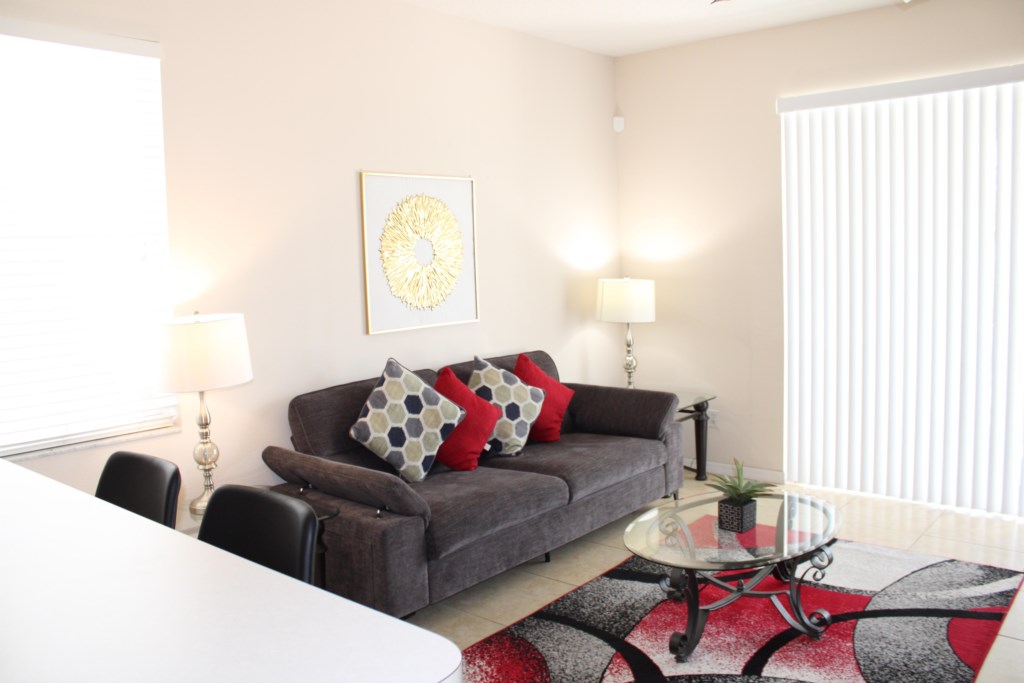 Bright, airy family room conveniently located just off the kitchen, perfect for relaxing and family gatherings.