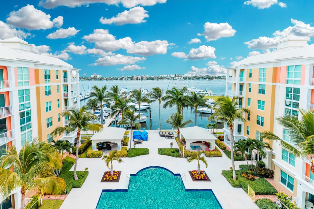 Luxurious pool and hot tub overlooking the marina and intercostal waterway