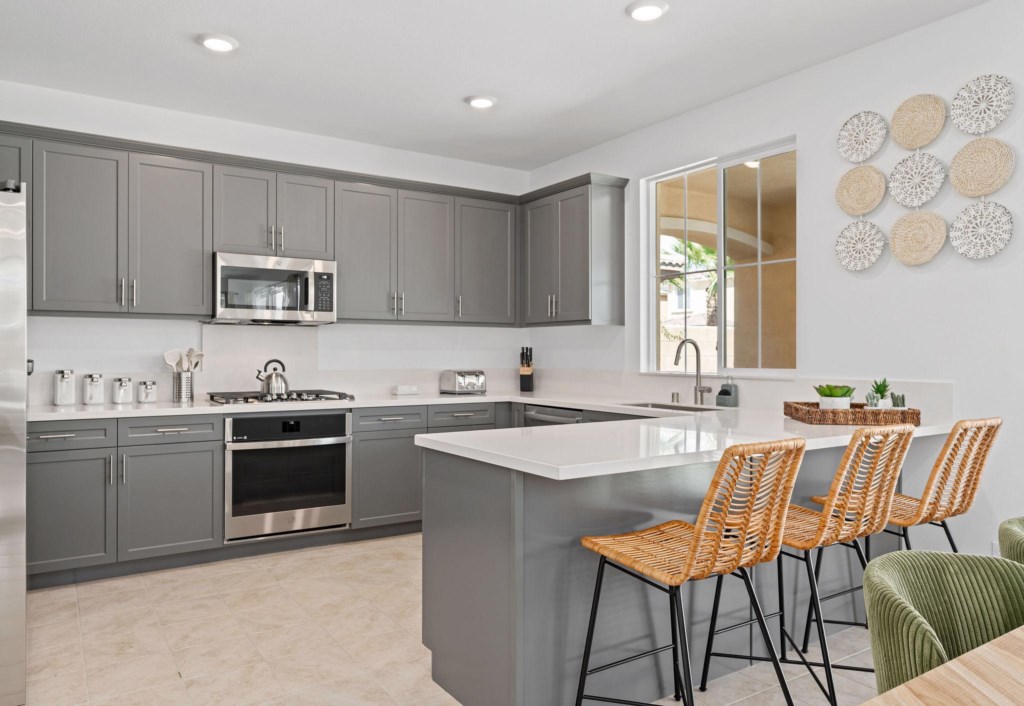 A spacious kitchen and gleaming countertop