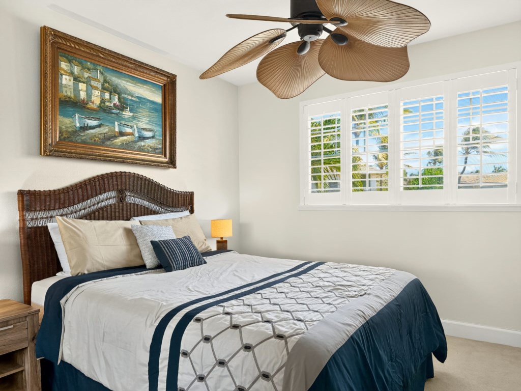 Bedroom 2 with Queen Bed, Ceiling Fan, and Plantation Shutters