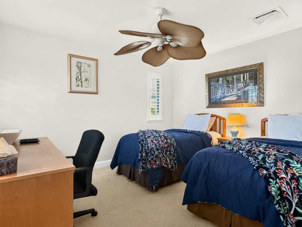 Bedroom 3 with 2 Twin Beds, Ceiling Fan, and Desk Area