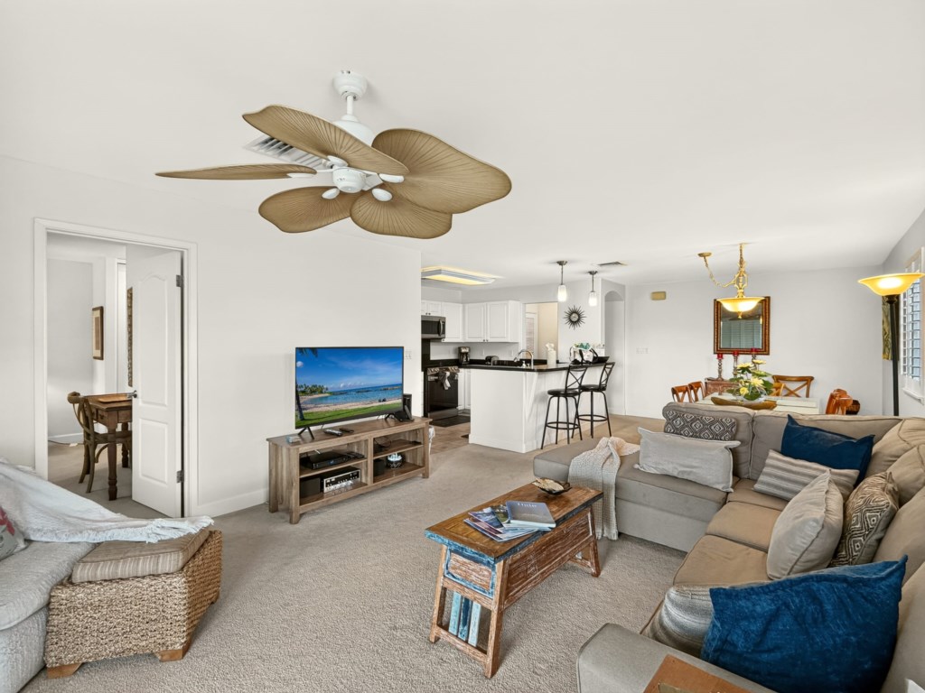 Living Area with Smart TV and Open to Kitchen and Dining Area