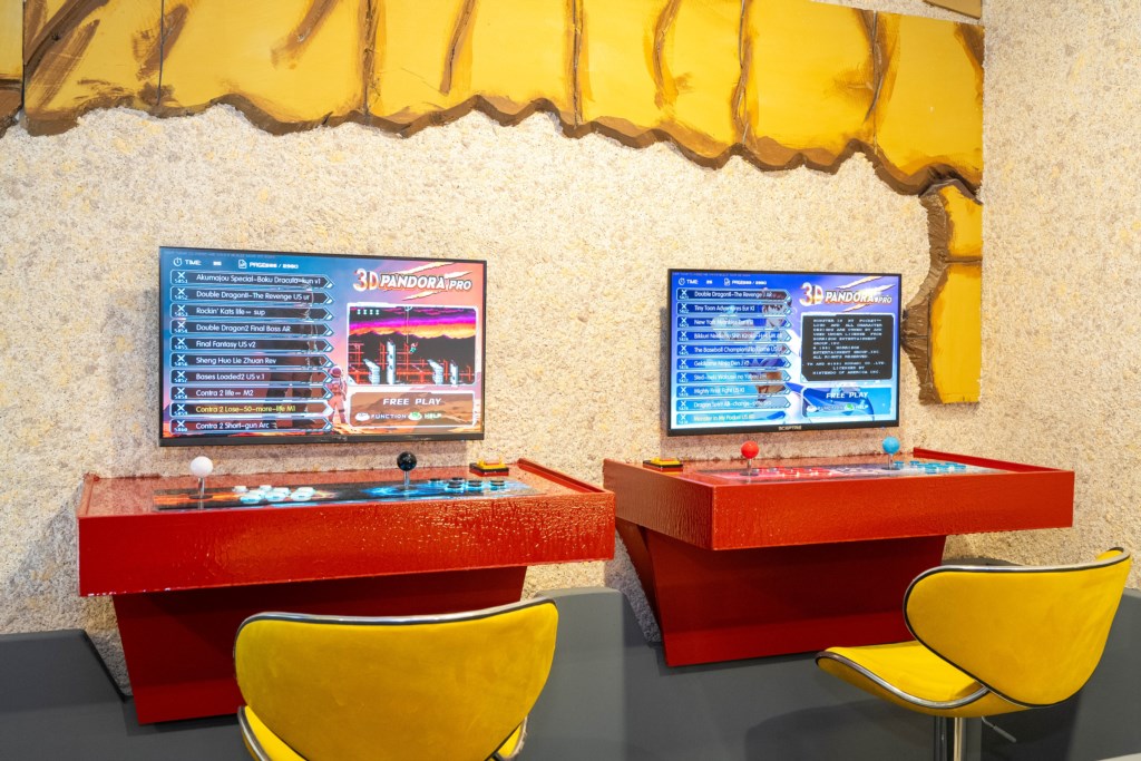 Donkey themed game room with arcades and foosball table