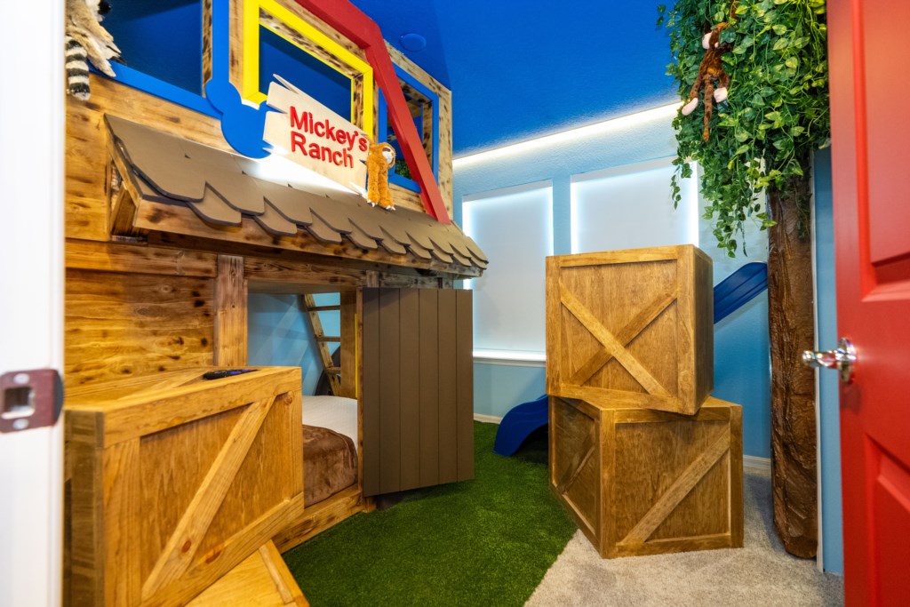 Mickey Ranch themed bedroom w/ slide (passage through the Toy Story bedroom)