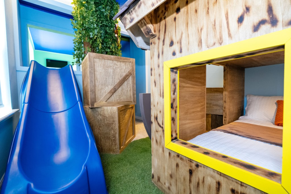 Mickey Ranch themed bedroom w/ slide (passage through the Toy Story bedroom)