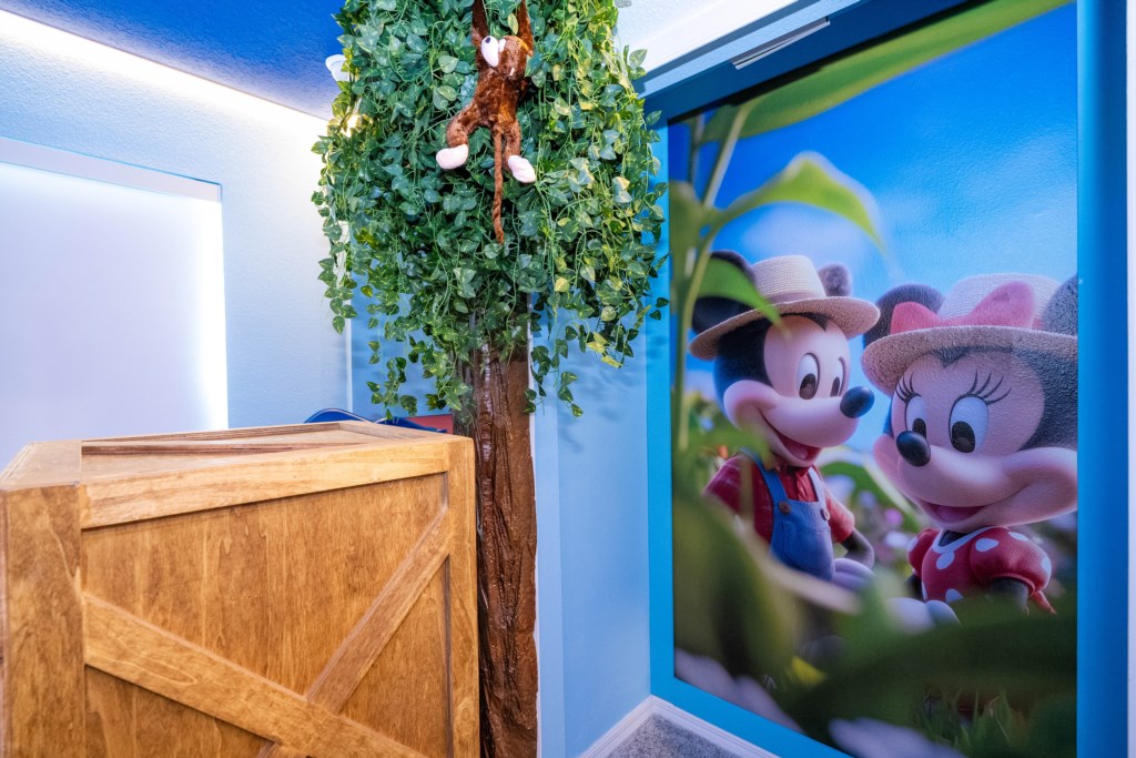 Mickey's Ranch themed bedroom w/ 2 full beds & 2 TV's