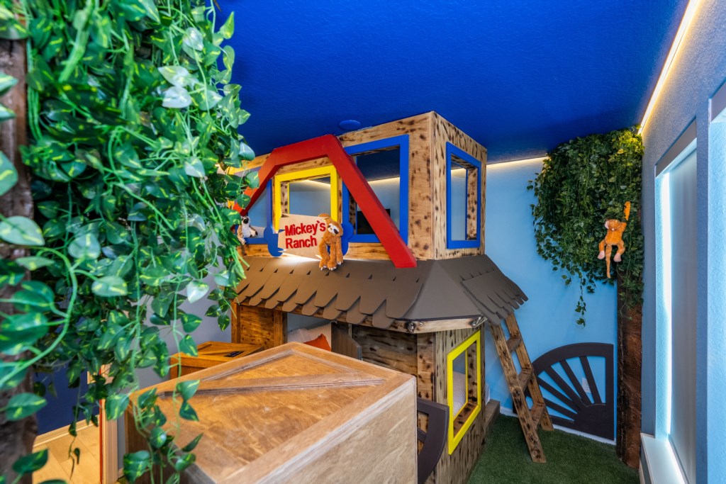 Mickey's Ranch themed bedroom w/ 2 full beds & 2 TV's