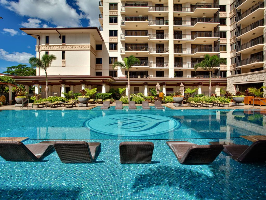 Ko Olina Beach Villa lap pool and in water lounge chairs.