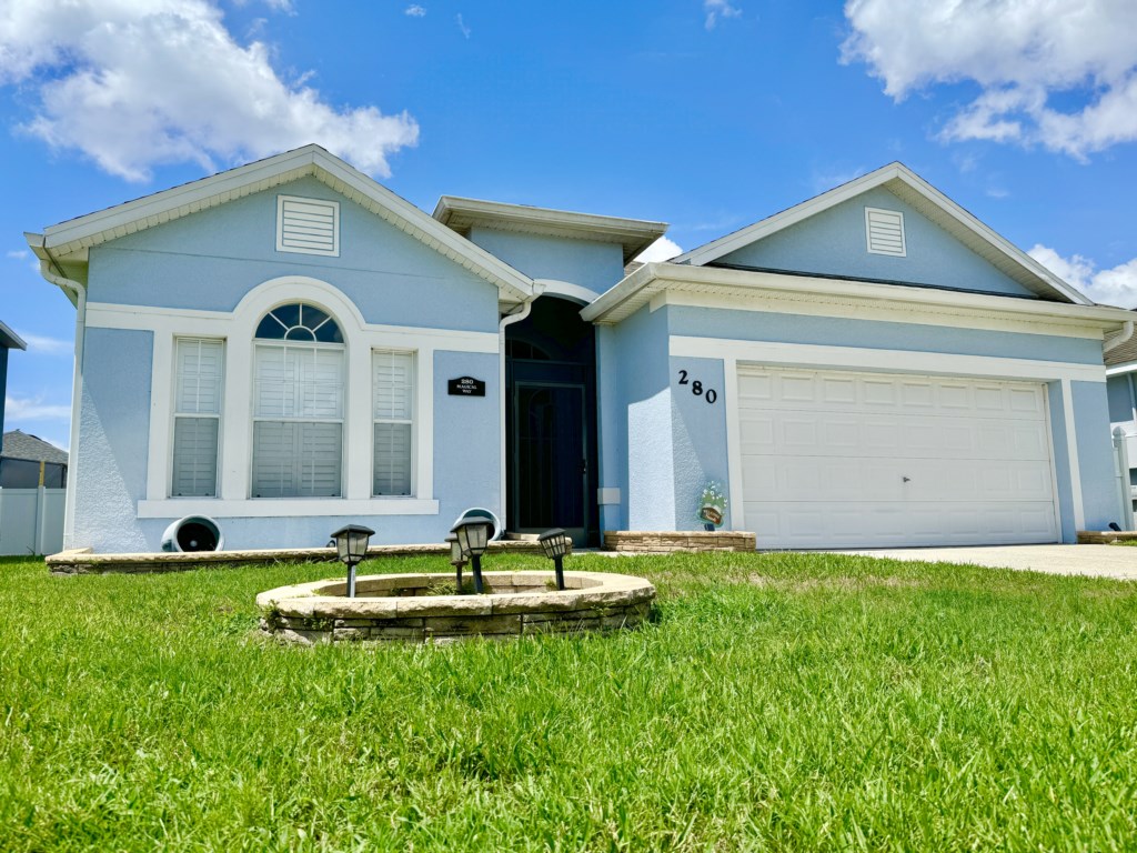 Welcome to your home away from home with spacious front yard and bright exterior.