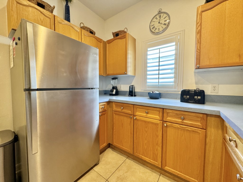 Bright and airy kitchen with plenty of storage and natural light.