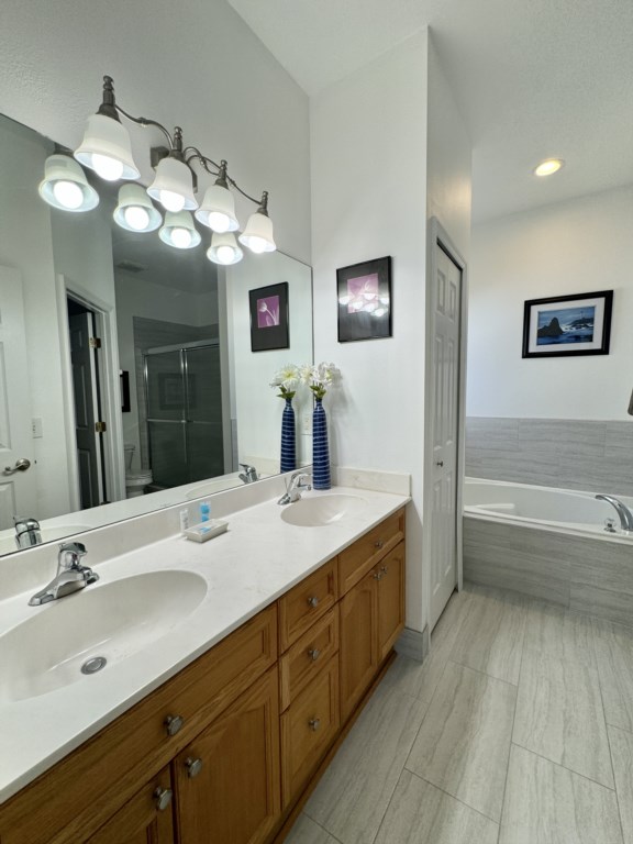 Dual-sink vanity in the master bathroom for convenience and luxury.