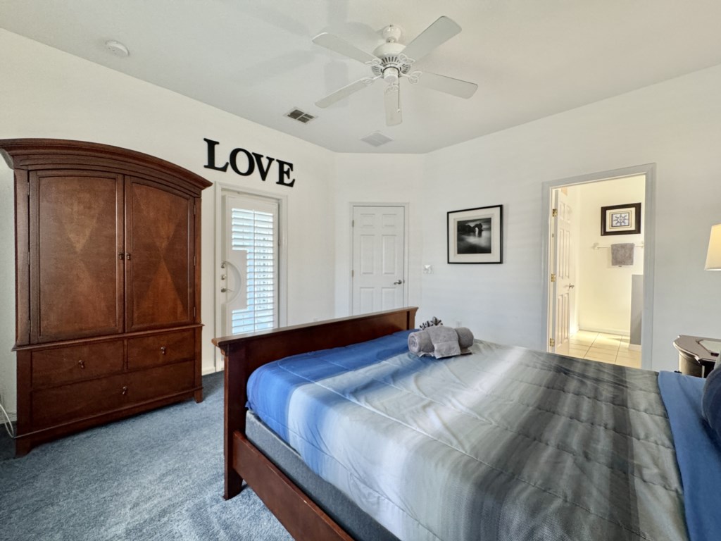 pacious bedroom with ample storage and a serene atmosphere.