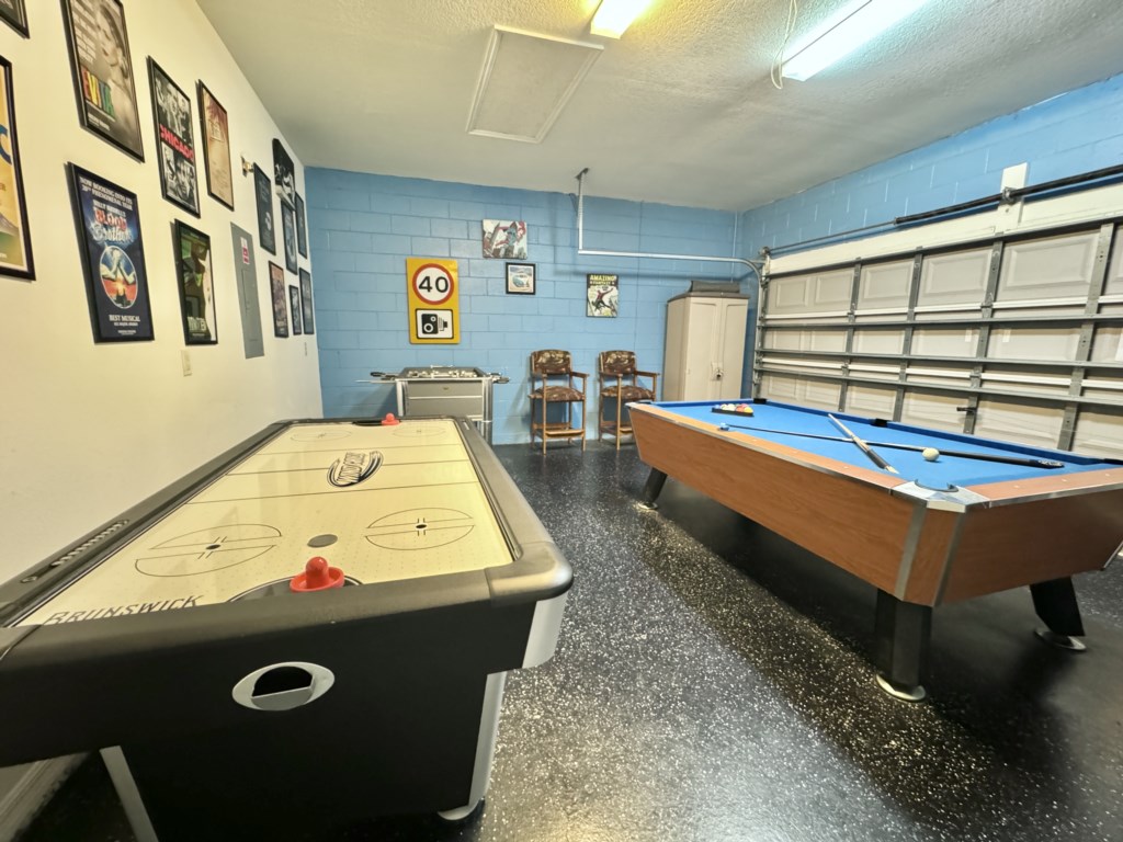 Enjoy family fun in the game room with air hockey and pool table.