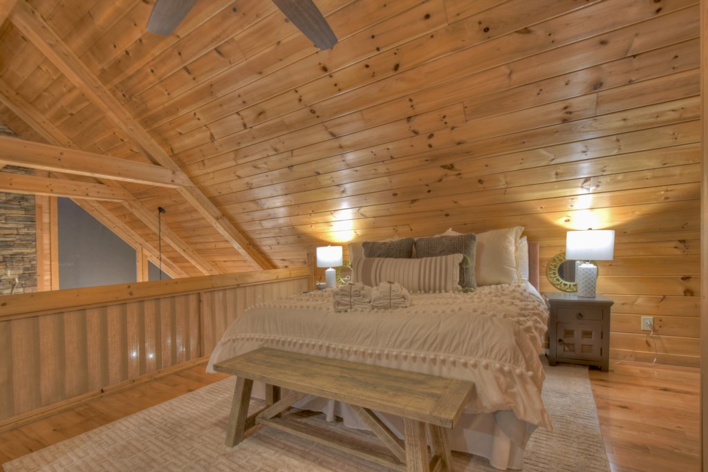 King bedroom in the open sleeping loft 