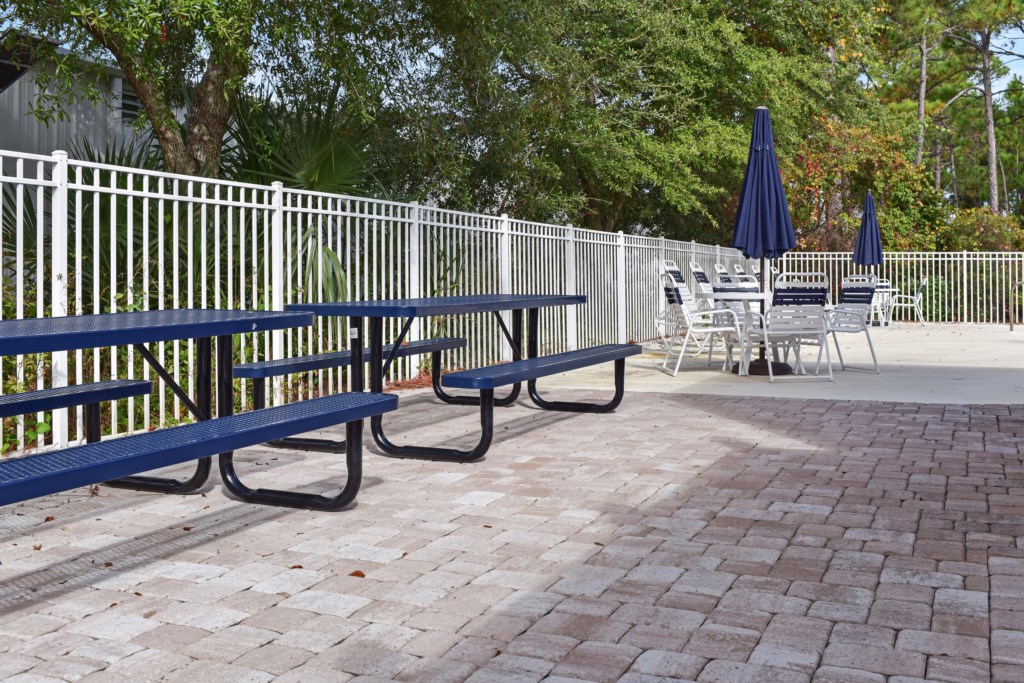 Picnic Tables At The Neighborhood Pool