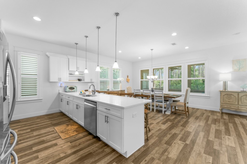 Dining Area with Bar Seating and Large Dining Table