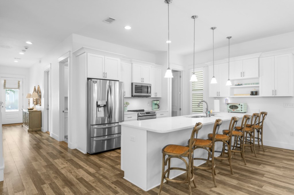 Spacious Kitchen With Bar Seating