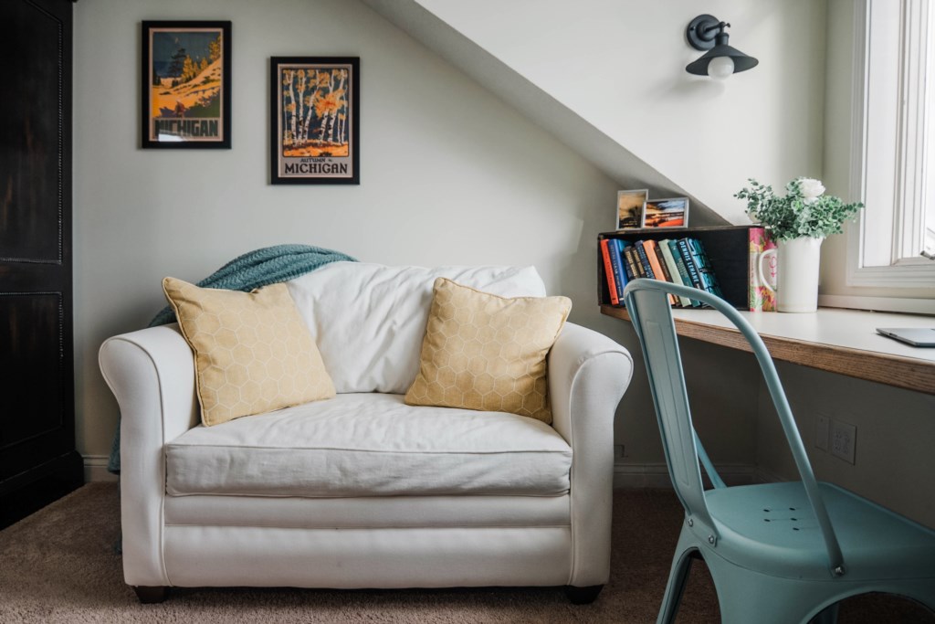 Oversized chair in the master suite folds out into a twin bed 