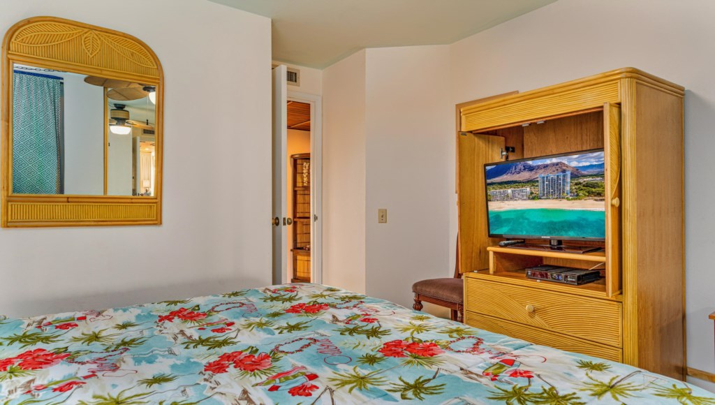 Bedroom with king bed and smart TV