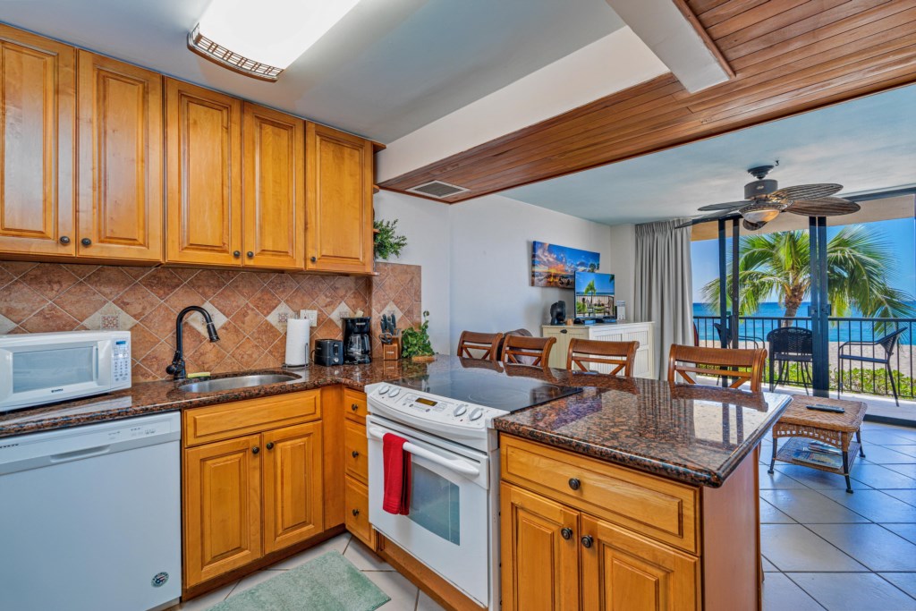 Fully equipped kitchen to the comfortable living area to the open beach