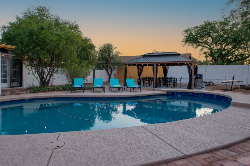 pool area with sun lounges