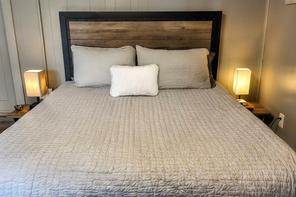 Tranquil lakeside retreat master bedroom