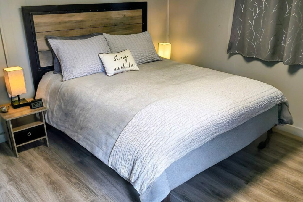 Tranquil lakeside retreat master bedroom